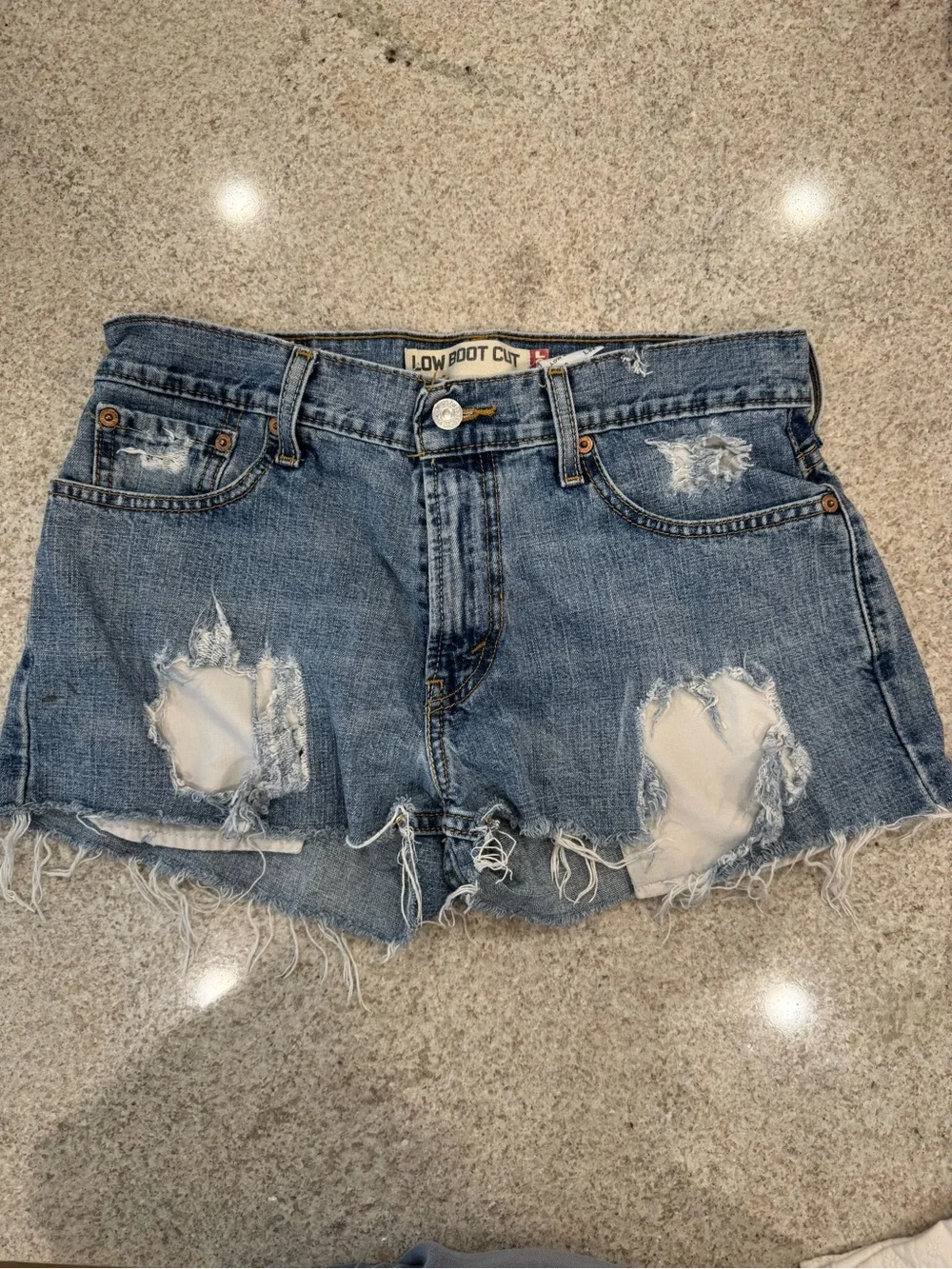 Levi's Distressed Blue Denim Shorts with Frayed Hem - Picture 1 of 3